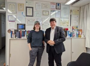 Prof. Boccaccini standing with Dr. Schmidt in an office.
